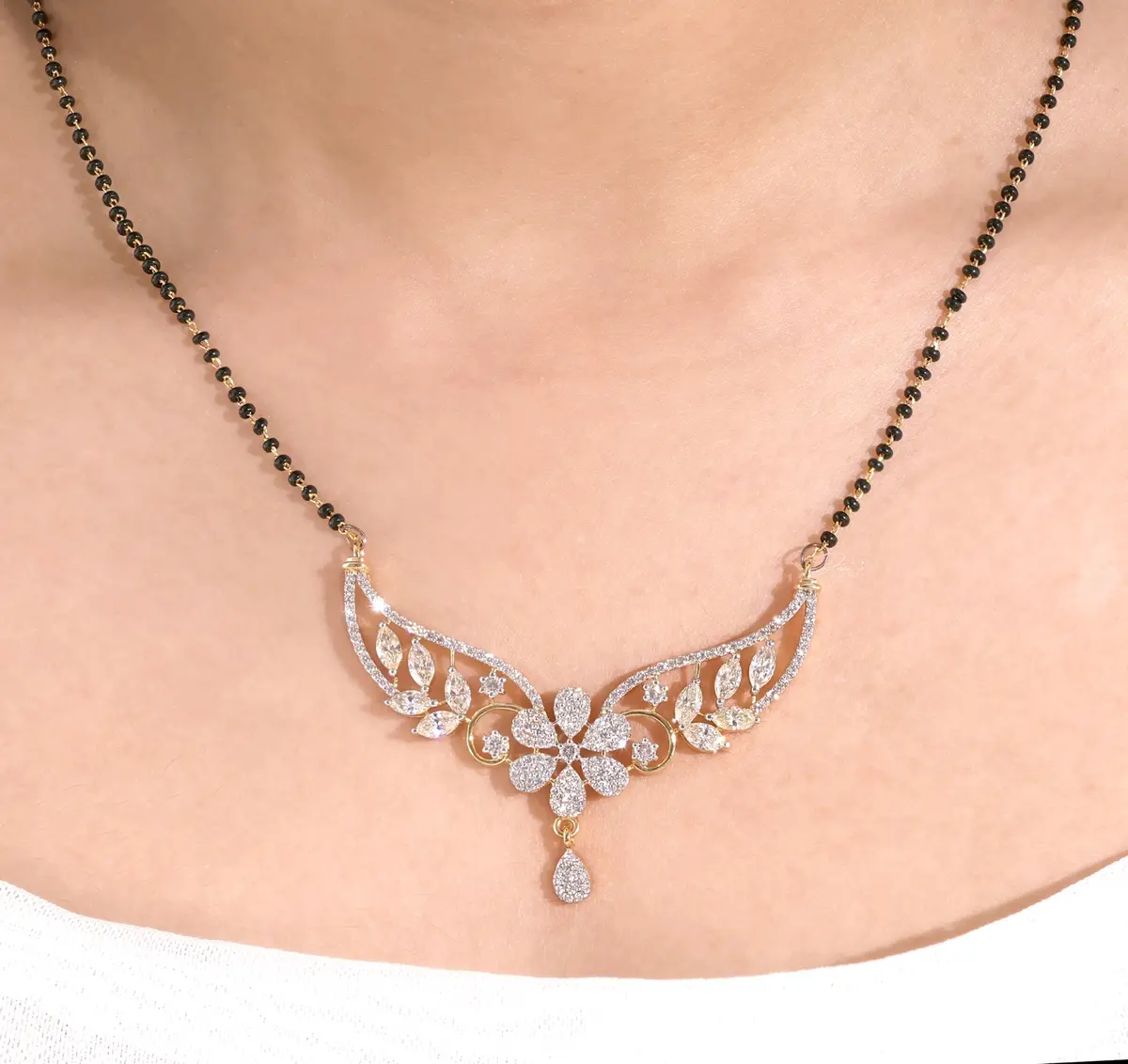 Floral diamond mangalsutra made by Desai Diamonds